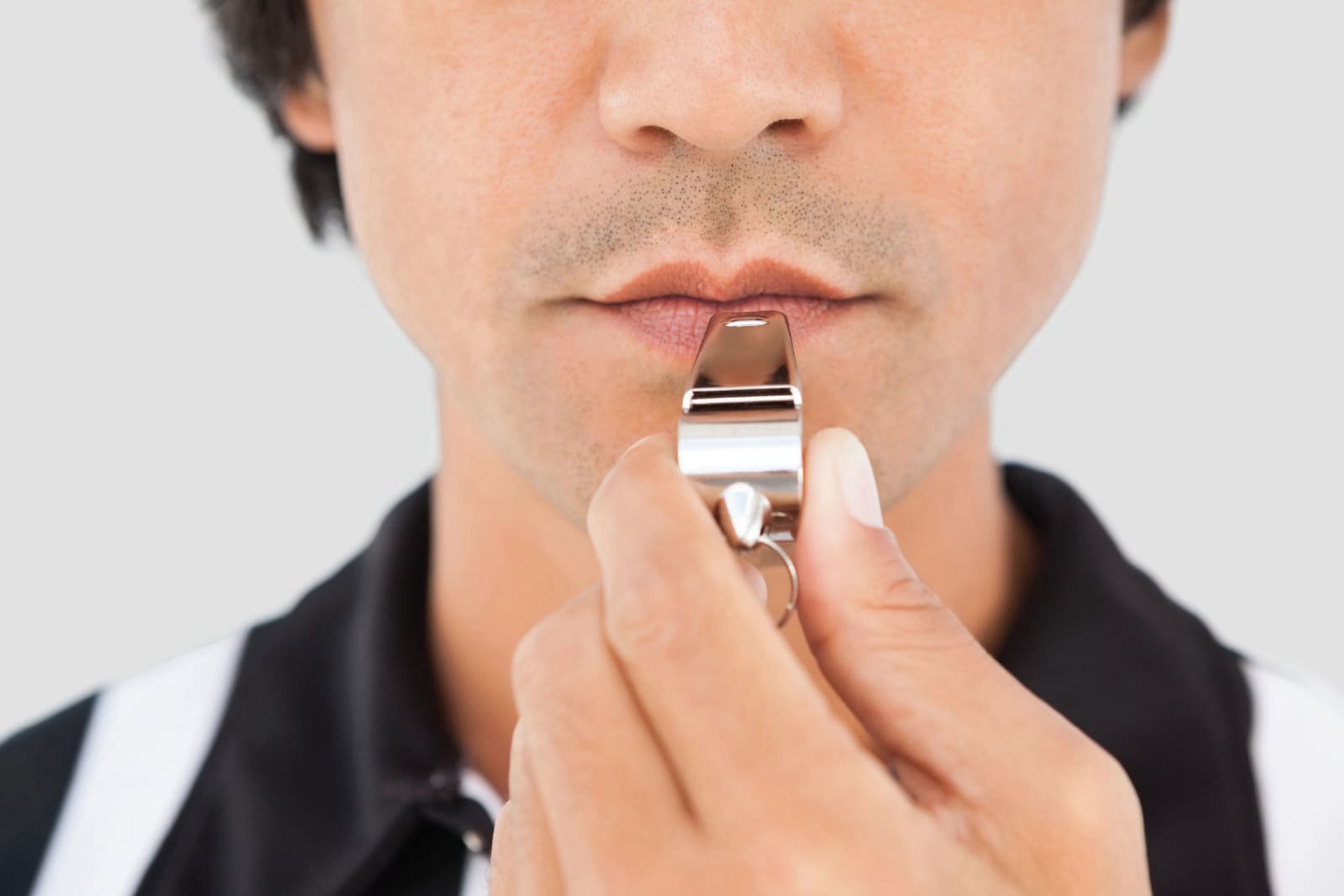 whistle in man's mouth